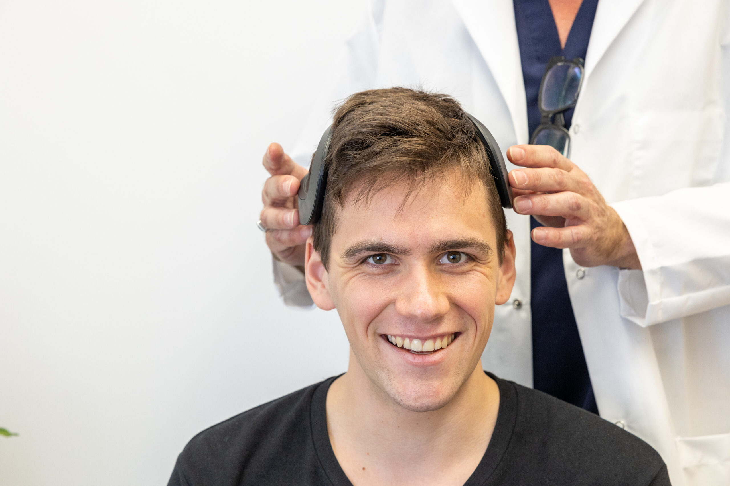 Therapist Working with Patient - Fitting Crown (male)