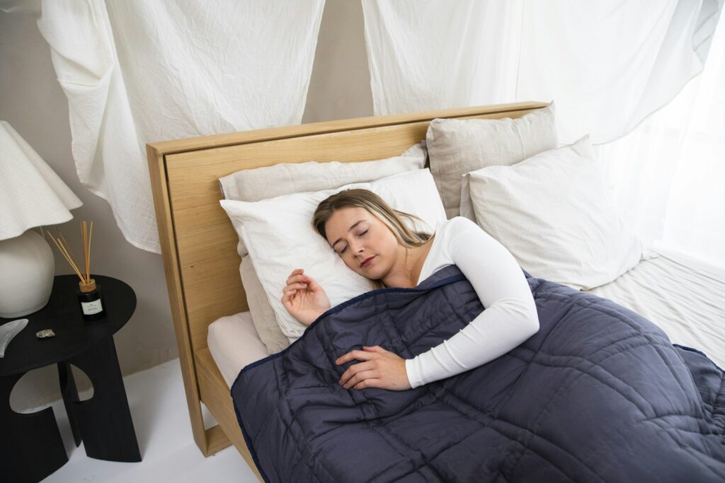 A woman sleeping peacefully in bed